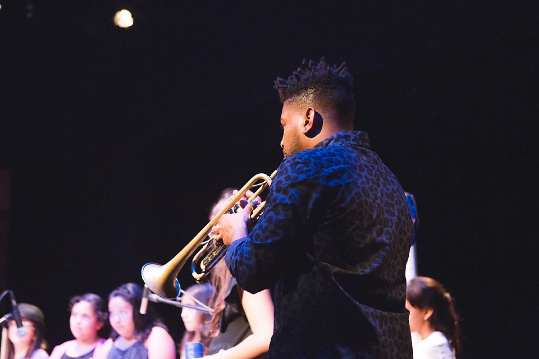 Corey Wilkes assisting the ensemble, June 19, 2014. Photo by Lesley Brown.