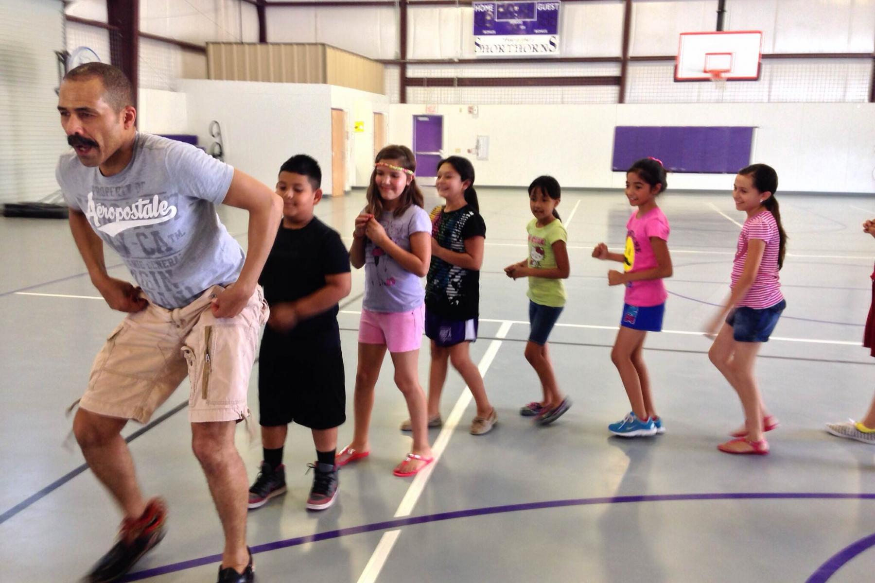 Kahil El'Zabar leading students at the Music Moves U workshop, June 17, 2014. Photo by Suzy Simon.