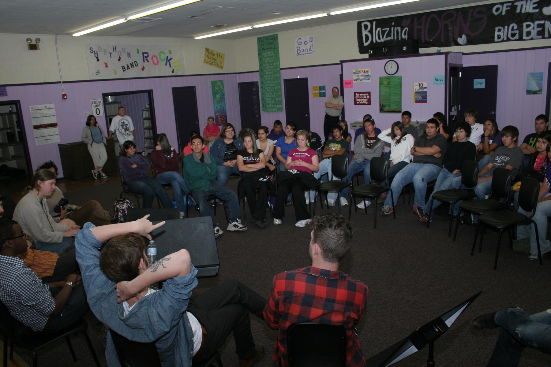 The band Yeasayer talking with students at Marfa High School