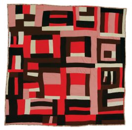 Mary Lee Bendolph, born 1935. "Housetop" variation, 1998; quilted by her daughter, Essie bendolph Pettway, in 2001, cotton, corduroy, twill, assorted polyesters, 72 x 76 inches. In the early 1990s, a former Bend resident living in Bridgeport, Connecticut, sent some garments -- double-knit leisure suits -- to Gee's Bend. Mary Lee Bendolph remembers: "My sister-in-law's daughter sent those clothes down here and told me to give them away, but didn't nobody want them. That knit stuff, clothes from way back yonder, don't nobody wear no more, and the pants was all bell- bottom. We ain't that out-of-style down here. I was going to take them to the Salvation Army but didn't have no way to get there, so I just made quilts out of them." q030-06.jpg